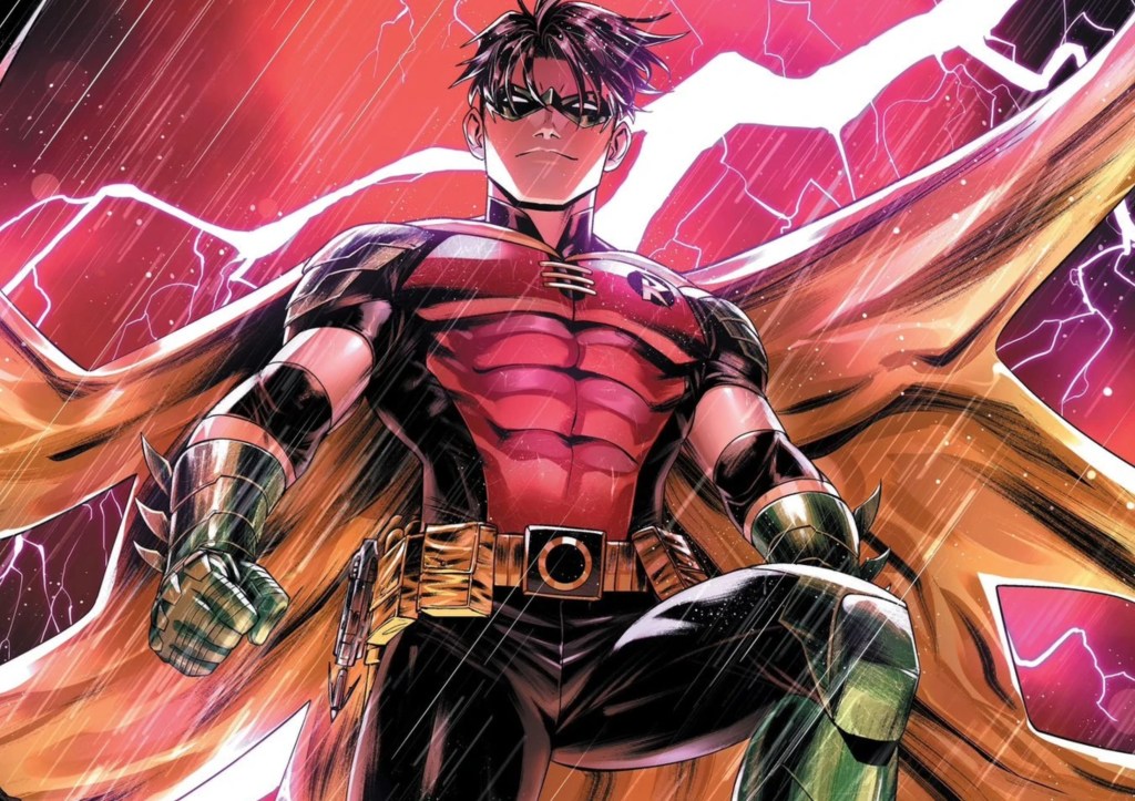 Tim Drake standing in the rain under a red sky, as lightning strikes behind him
